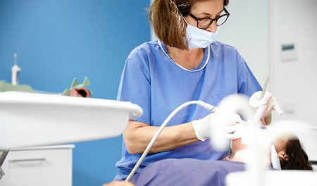 Шинирование зубов в Германии